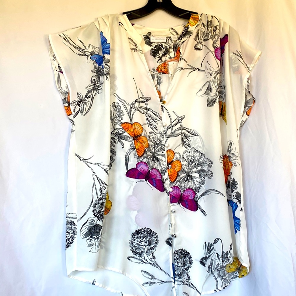 Vibrant butterfly and floral blouse by New York and Company
